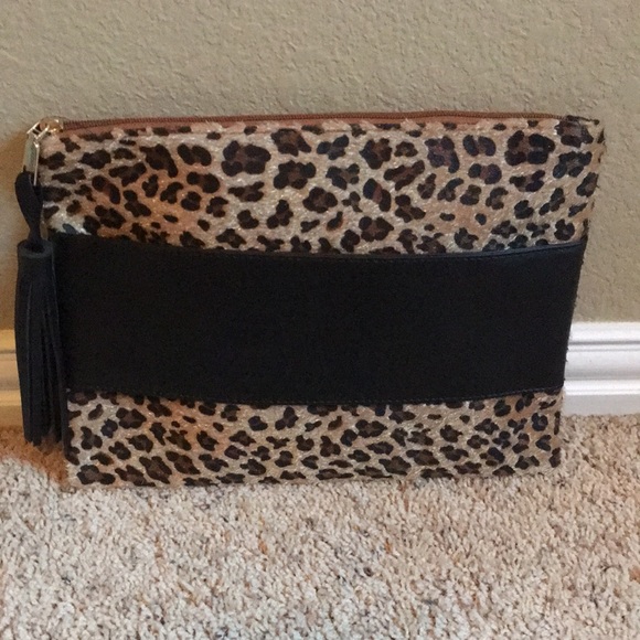 oversized leopard clutch